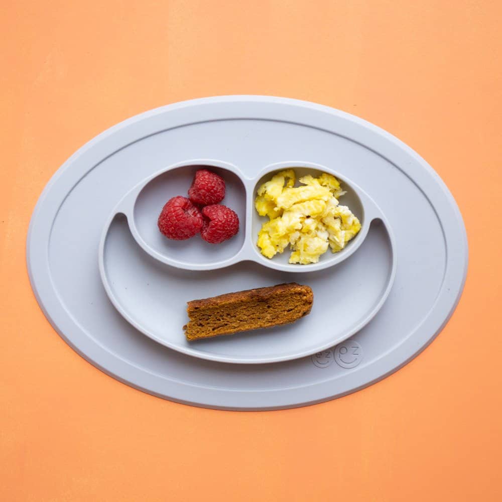 Balanced baby meal: raspberries, scrambled eggs, and biscotti