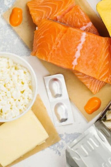 Food sources of vitamin D - cottage cheese, supplements, salmon are in the photo.