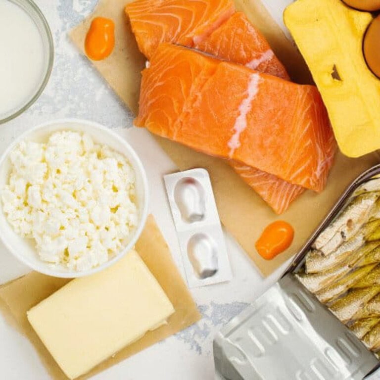 Food sources of vitamin D - cottage cheese, supplements, salmon are in the photo.