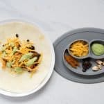 A side by side image of a chicken fajita ready to wrap for mom and dad beside a baby friendly version in a divided plate.
