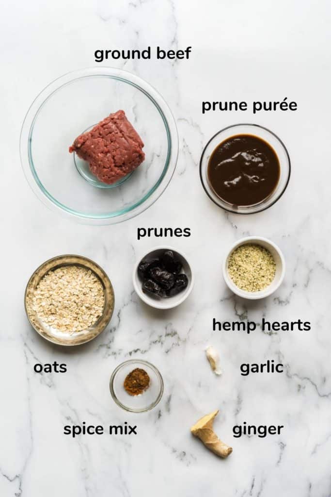 labeled ingredient image for baby prune burgers: ground beef, prune puree, prunes, oats, hemp hearts, spices, garlic, and ginger