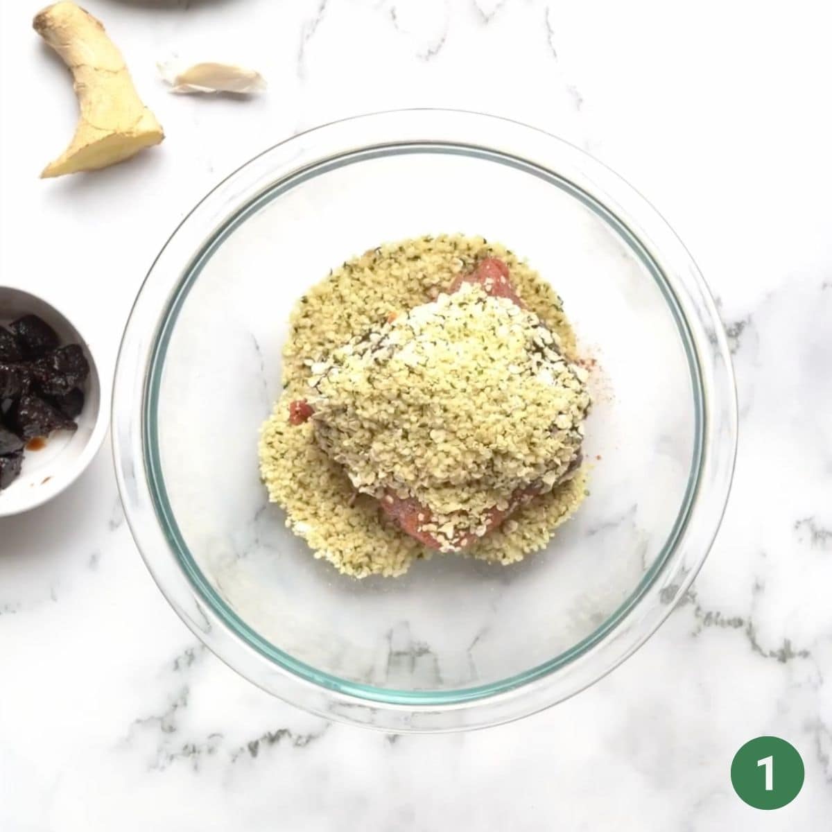 Ingredients for baby prune burgers in a mixing bowl.
