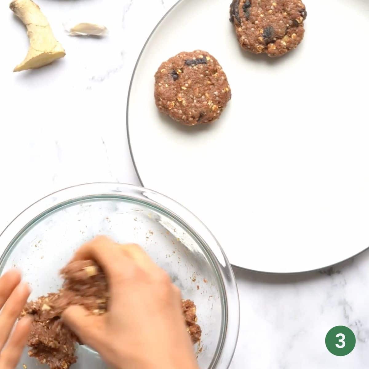 Forming the baby prune burger mix into patties.