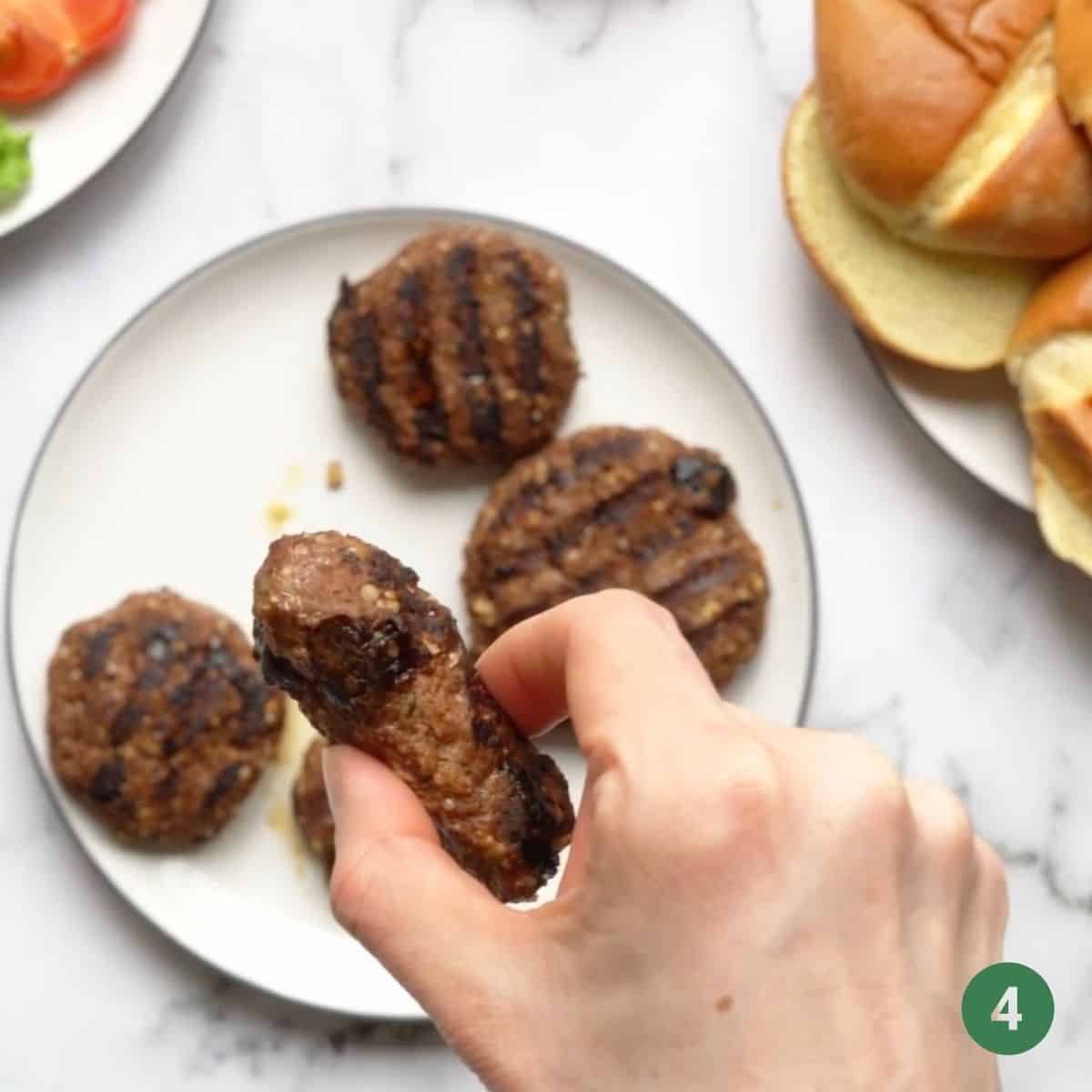 The camera is focused on the kebab shape for the baby prune burgers to highlight how this is a good shape for baby to be able to pick it up.