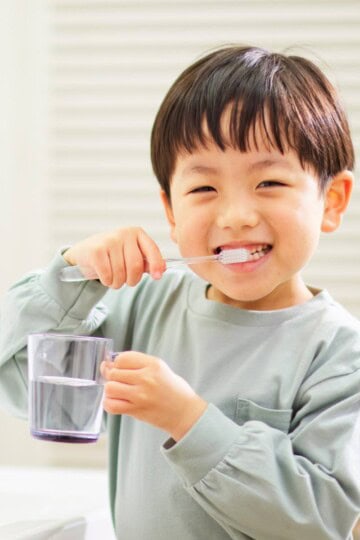 toddler brushing teeth