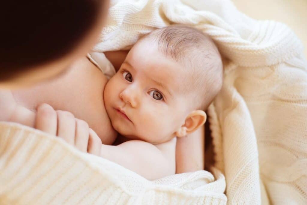 Feeding your baby solids early may help them sleep, study suggests