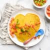 a plate of baby friendly chilla pancakes with a baby fork