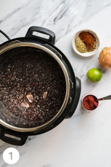 black beans that are cooked in an electric pressure cooker