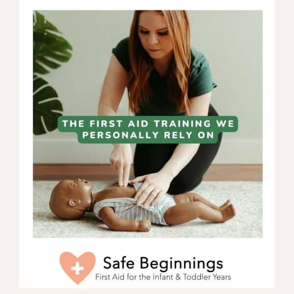 Image of Holly Choi demonstrating how to perform CPR on a dummy of an infant