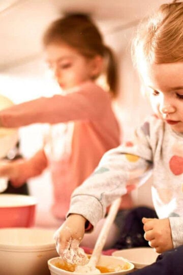 little girls helping to make cookies