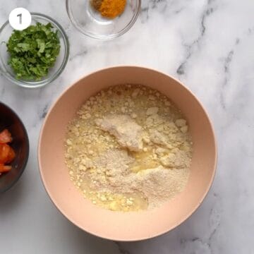 Chickpea flour and baby cereal with some water in a bowl. 