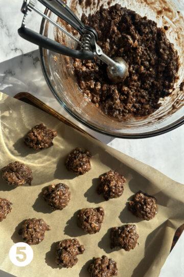 image of prune cookie batter being scooped out onto a baking sheet