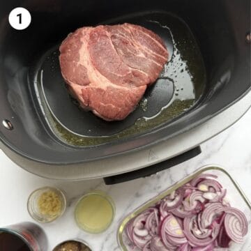 Roast beef being seared in a large pot for sumac beef recipe.