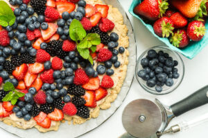 A healthier fruit pizza with a sauce sweetened by dates instead of refined sugar. Perfect for toddlers.