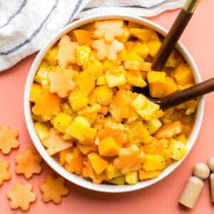 A bowl of toddler-friendly nutrition boosted fruit salad.