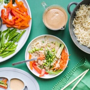 A choose-your-own-adventure meal: sesame bowls with noodles, fresh veggies, and a delicious sesame sauce.