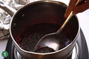 Making toddler friendly chia berry jam.