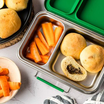 Three Mennonite meat buns in a lunchbox with cut carrots.