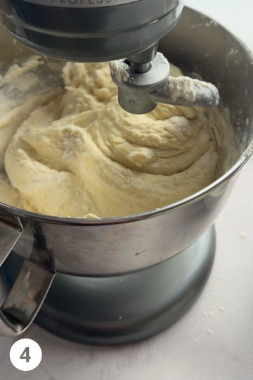 Dough being prepared in a stand mixer for mennonite meat buns.