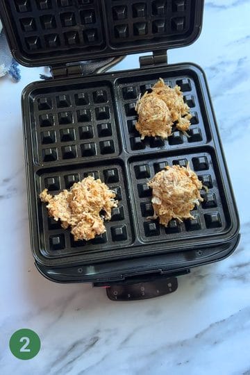 Chicken taco waffle "batter" scooped into the waffle iron with a muffin scoop.